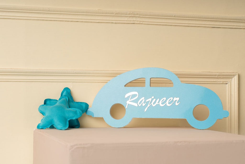 car on stand with name.jpg